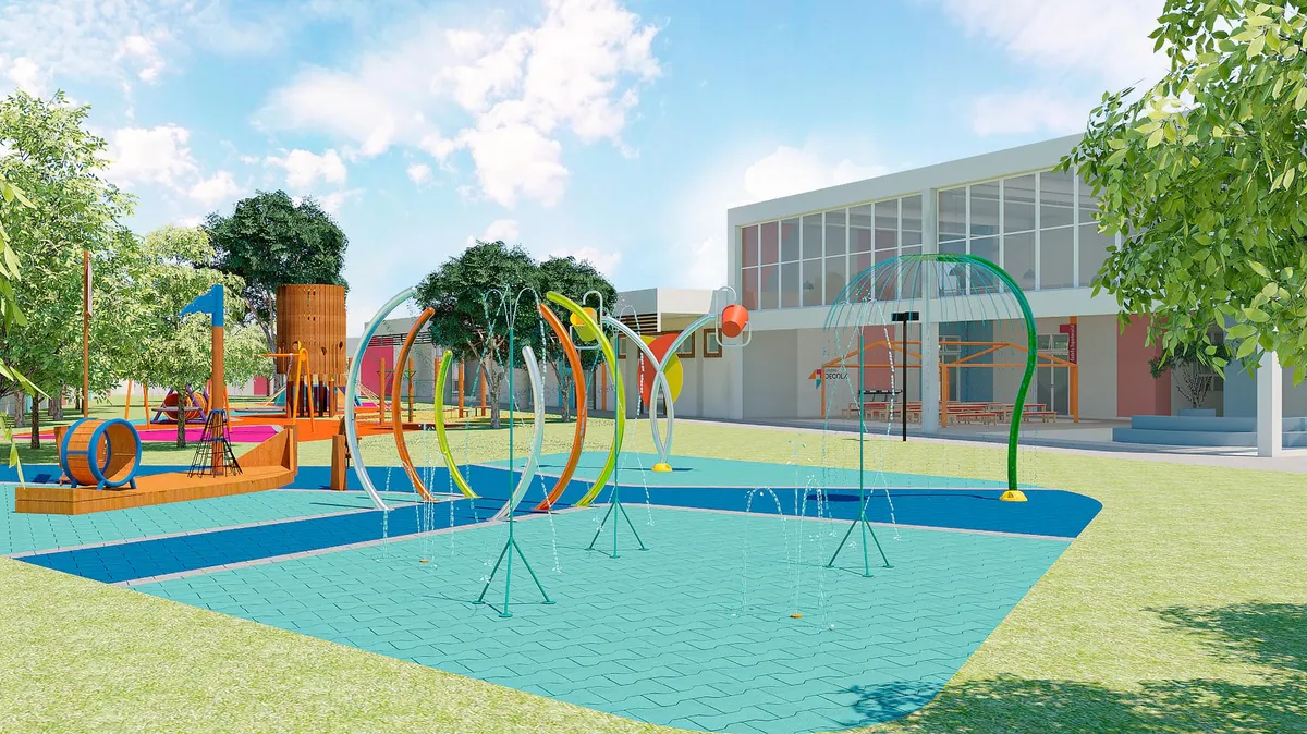 Perspectiva 3D de parquinho aquático com arcos de jatos d'água sobre piso azul, playground e prédio da escola ao fundo.
